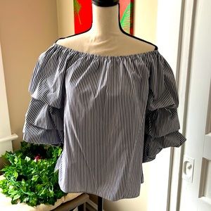 Off the shoulder stripped shirt.